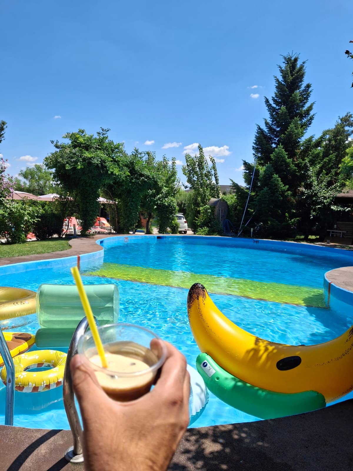 Outdoor pool in summer at Motanul Galanton, near Bucharest